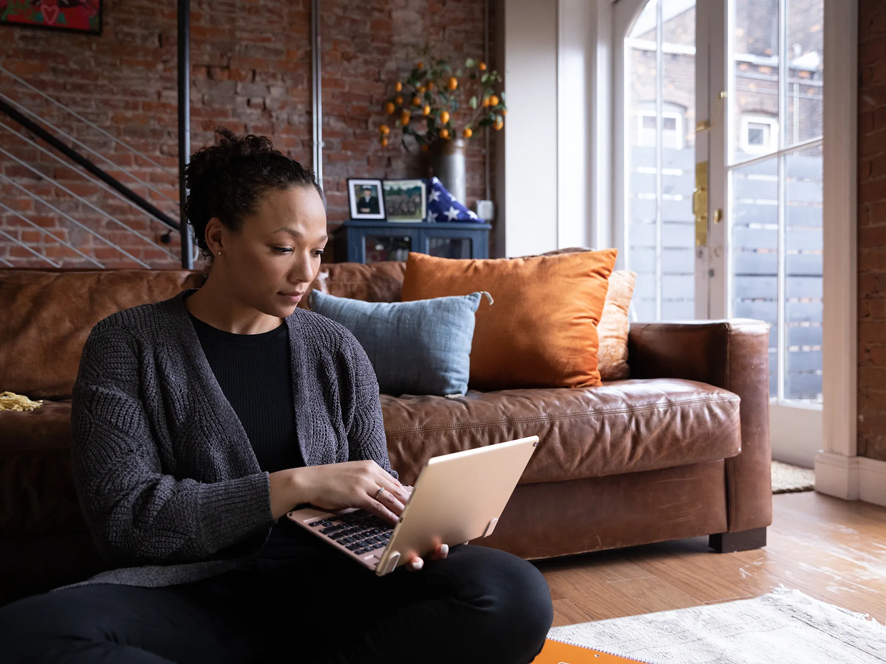 Student studying online in the comfort of their home